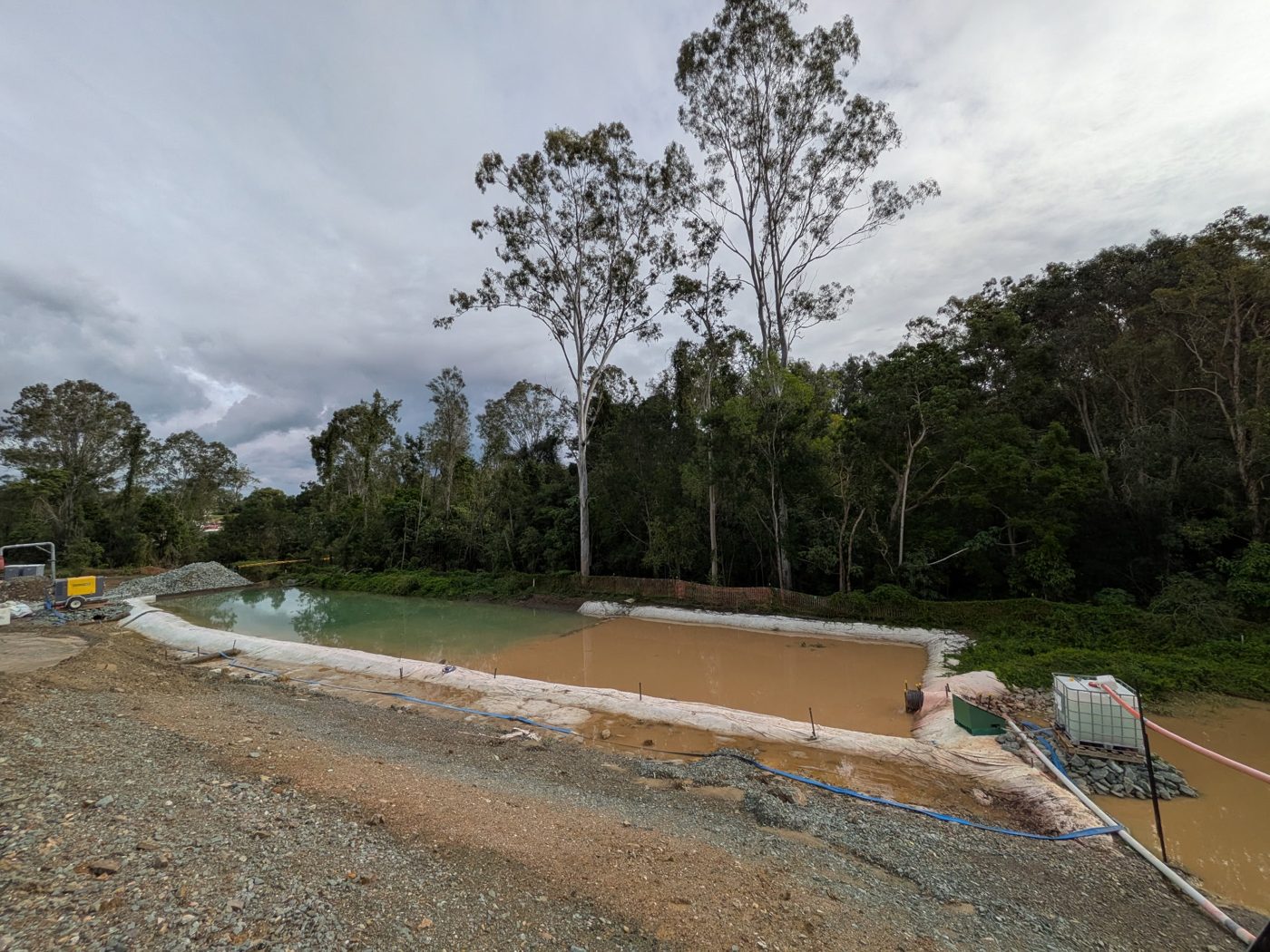 Sediment basin with treated water appearing